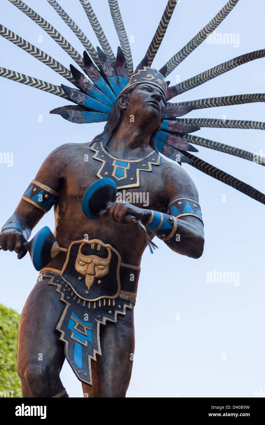 Plumed Indian dancer near Templo de San Francisco in the Spanish ...