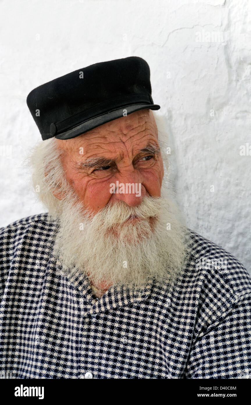 Naxos. Cyclades. Greece. Portrait of an old white bearded man at the marble mountain village of Apirathos. Stock Photo