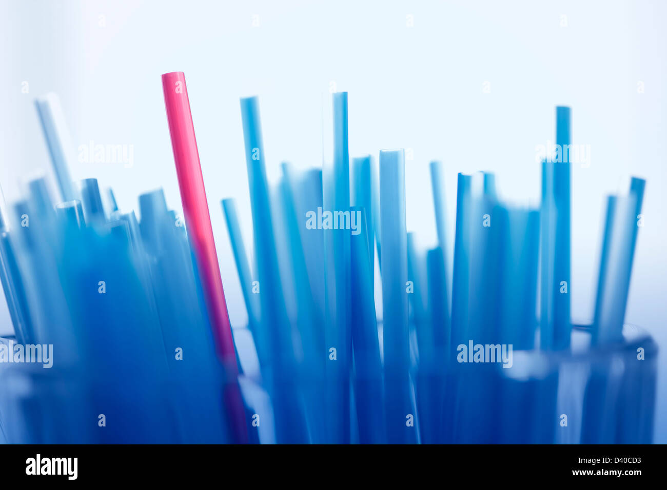 Plastic straws with one standing out Stock Photo Alamy