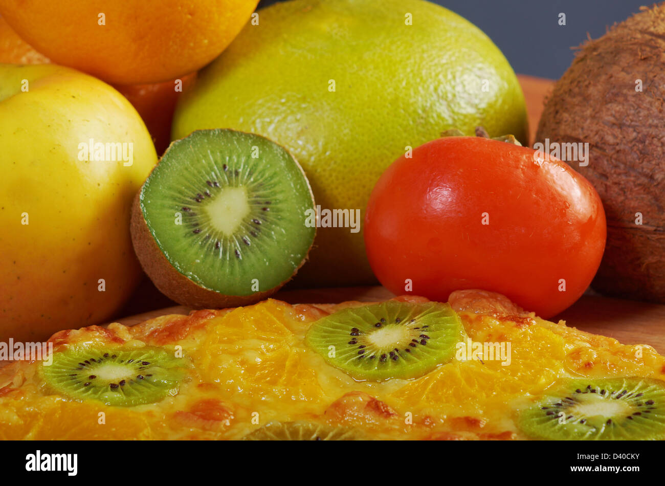 homemade sweet pizza with fruit.with orang kiwi,sauce Stock Photo - Alamy