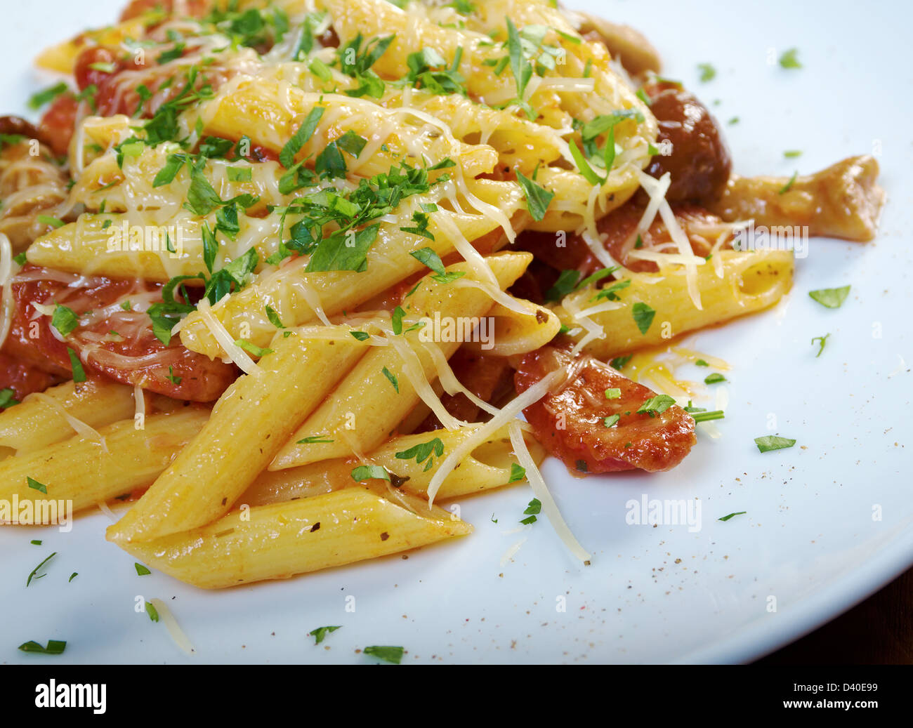 Italian Penne rigate pasta with sausage,perish Stock Photo - Alamy