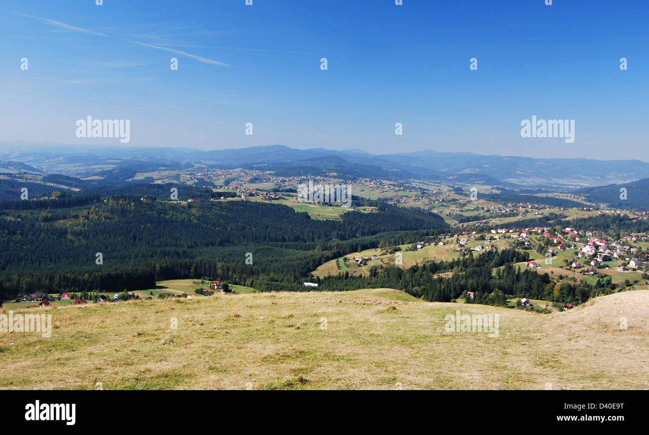 panorama from Ochodzita hill under Koniakow willage in polish Beskid Slaski mountains with hills and nice mountain countryside Stock Photo
