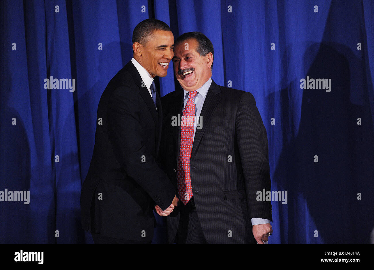 Washington DC, USA. 27th February 2013. United States President Barack Obama is greet by Andrew Liveris, President, Chairman, and Chief Executive Officer of The Dow Chemical Company at the Business Council dinner February 27, 2013 at the Park Hyatt Hotel in Washington, DC..Credit: Olivier Douliery / Pool via CNP/Alamy Live News Stock Photo