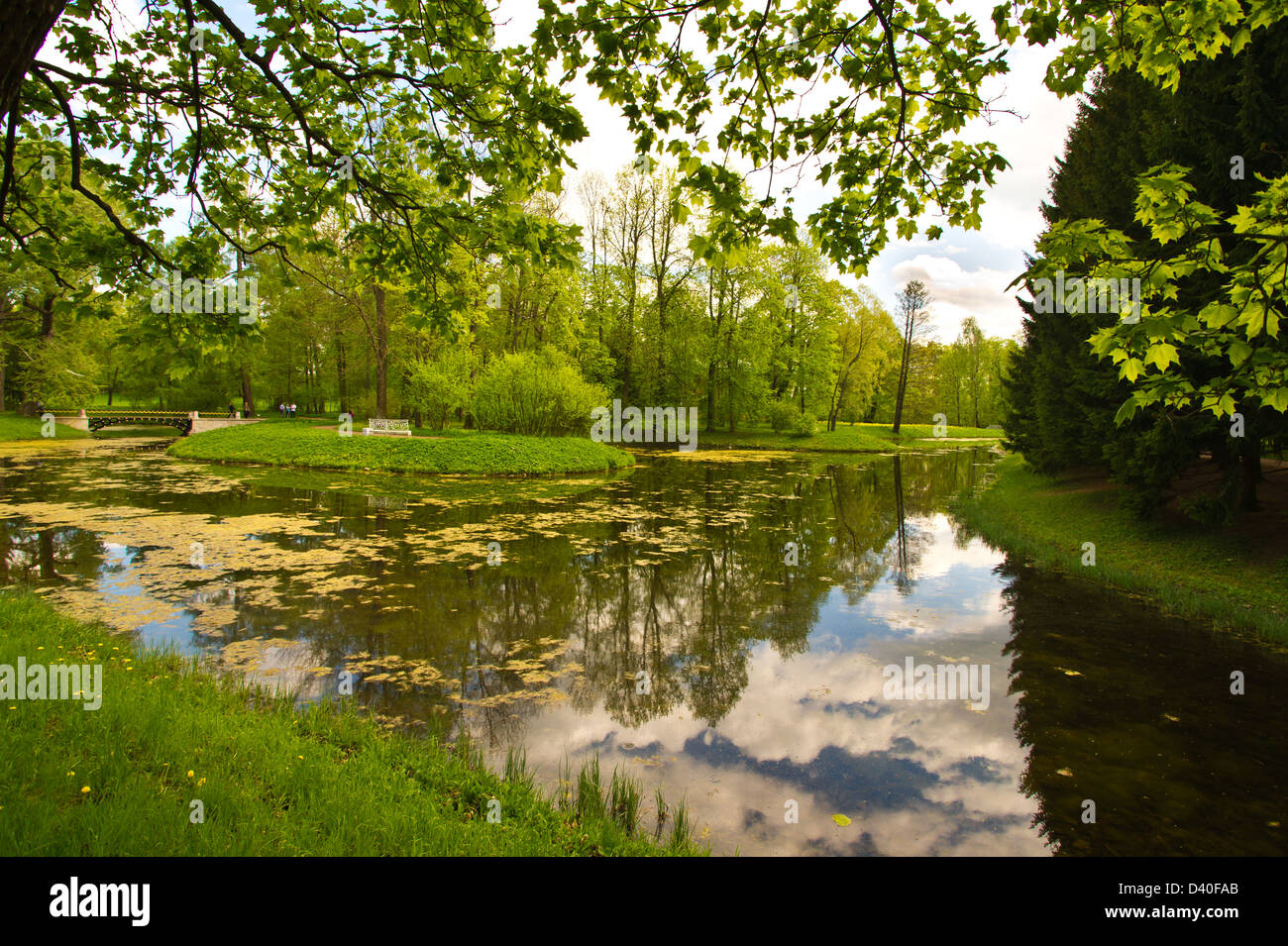 Landscape with a lake in city park Stock Photo - Alamy