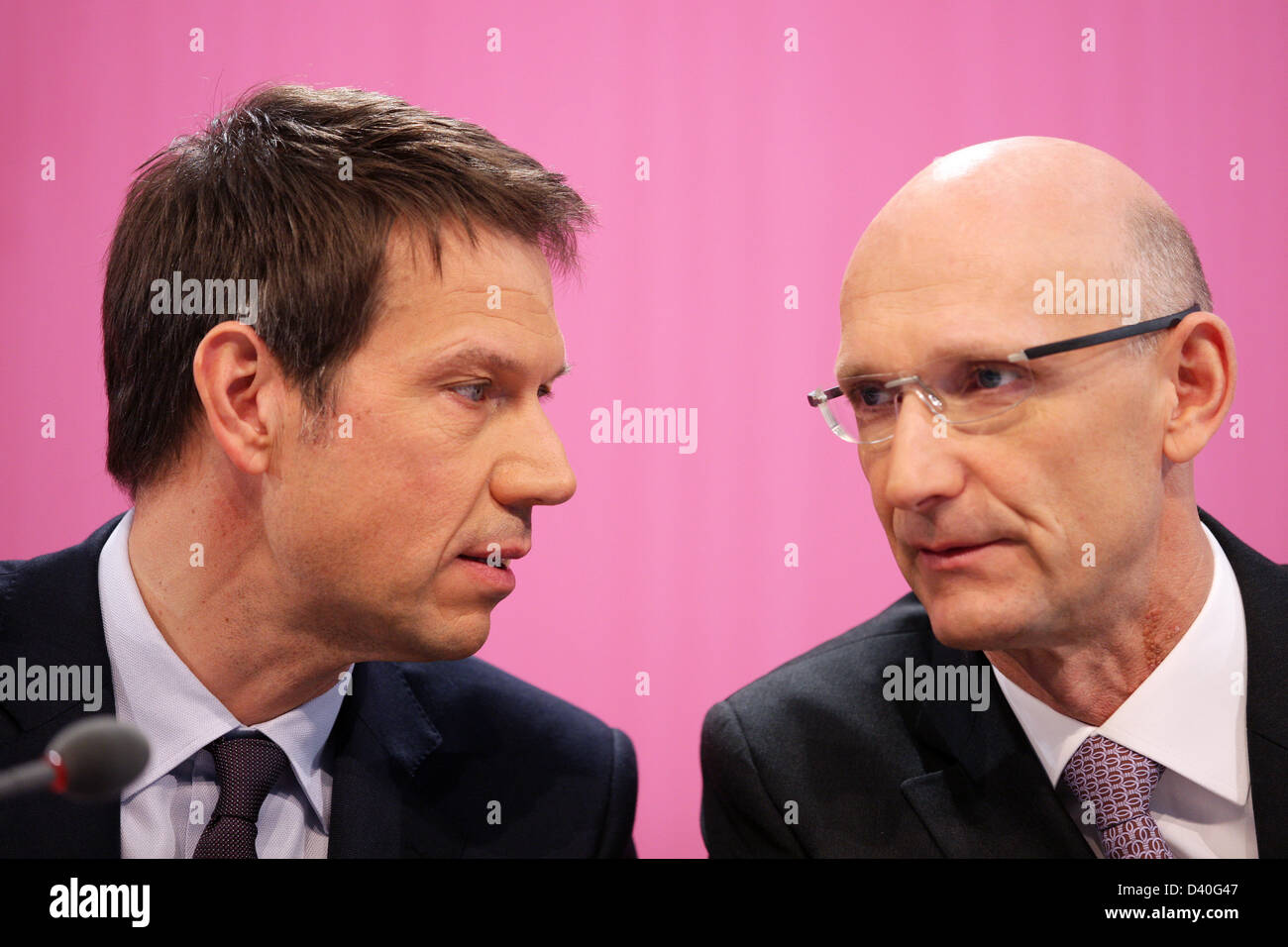 Deutsche Telekom chairman and CEO Rene Obermann (l) and CFO Timotheus Hoettges attend the company's balance press conference in Bonn, Germany, 28 February 2013. Photo: ROLF VENNENBERND Stock Photo