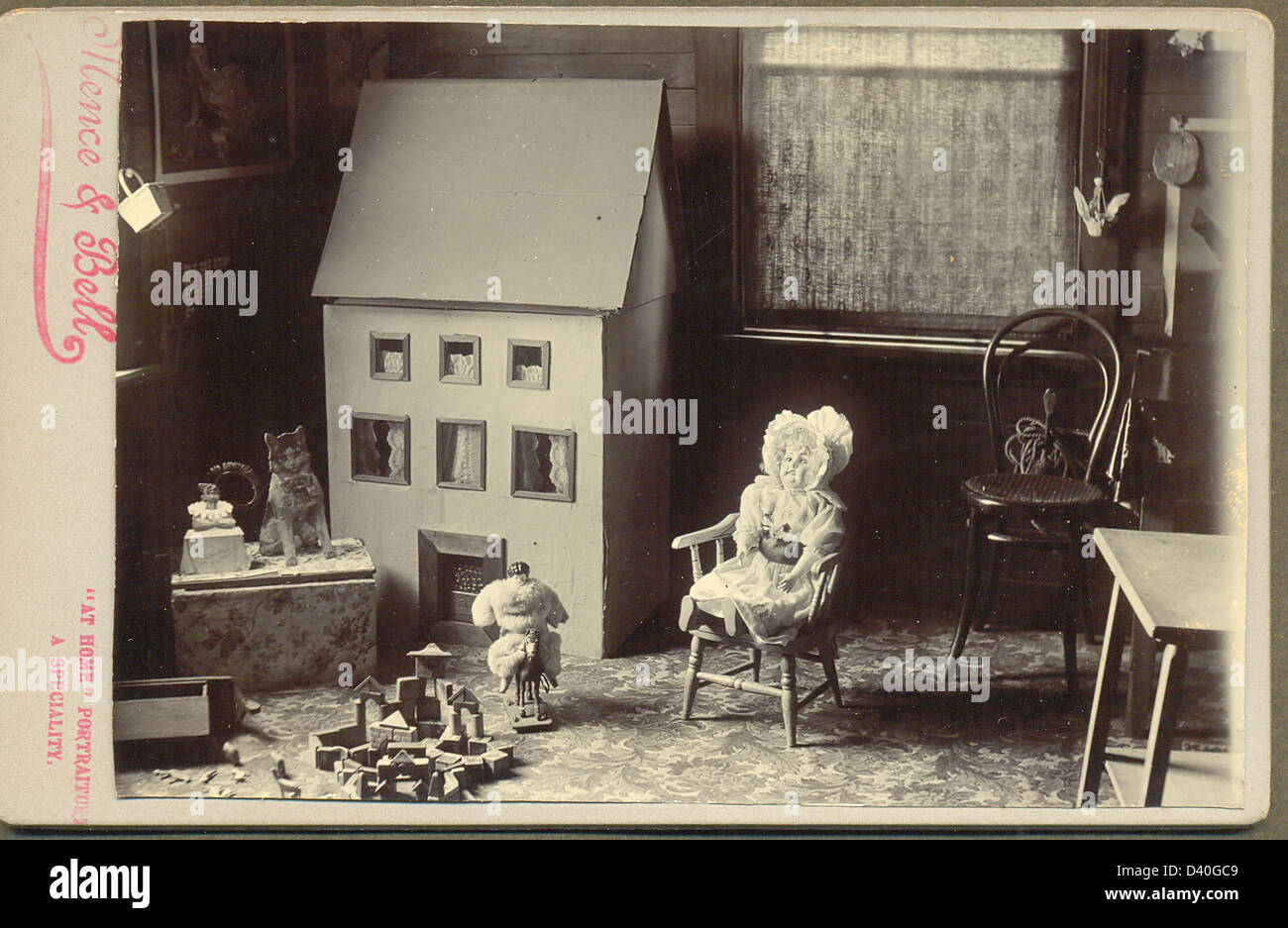 Cabinet photograph of doll's house and toys taken by Mence & Bell, Wanganui, New Zealand Stock Photo