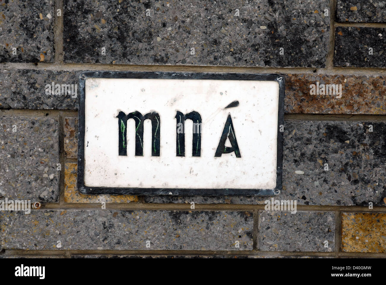 Mna is for Women's toilet or washroom in Gaelic, seen in Ireland Stock