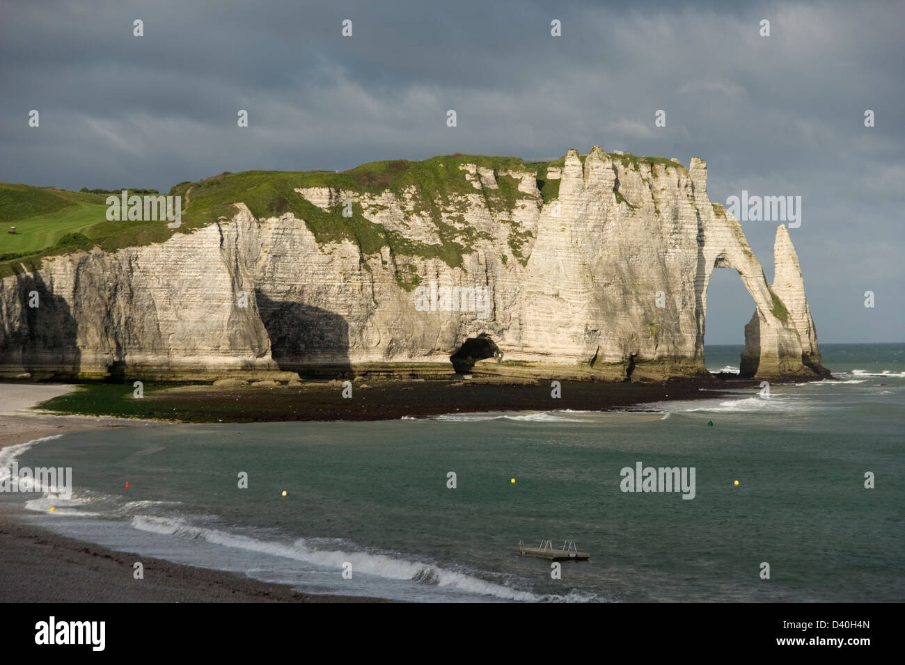 The beach and sea cliffs at Etretat in Normandy France Stock Photo - Alamy