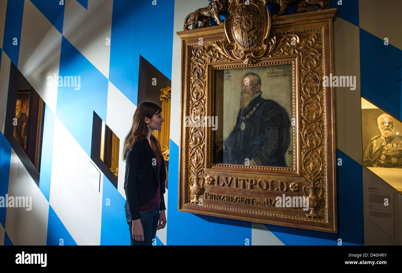 A woman looks at a painting by Franz von Stuck showing Prince Regent Luitpold at the special exhibition 'Kingdom  Palatinate' at the historical museum in Speyer, Germany, 27 February 2013. The exhibition gives an impression of the history of Palatinate. Photo: UWE ANSPACH Stock Photo