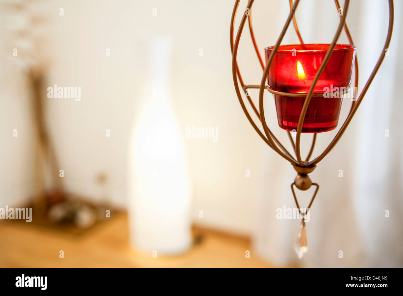 Candle in red glass Stock Photo Alamy