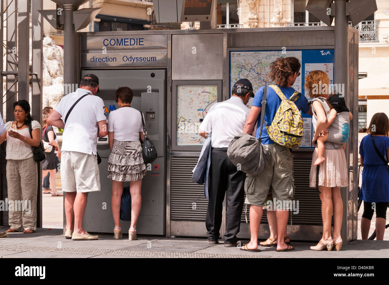 People buying tramway tickets at Place de la Comedie station, Montpellier, Hérault, Languedoc-Roussillon Stock Photo