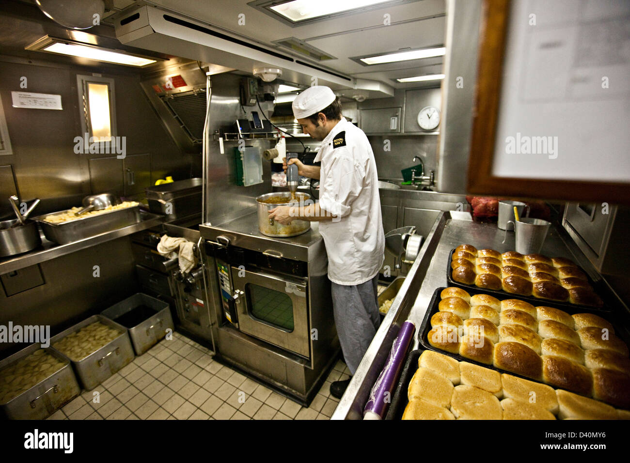 Chef working in kitchen of Nuclear Submarine HMS Talent Stock Photo Alamy