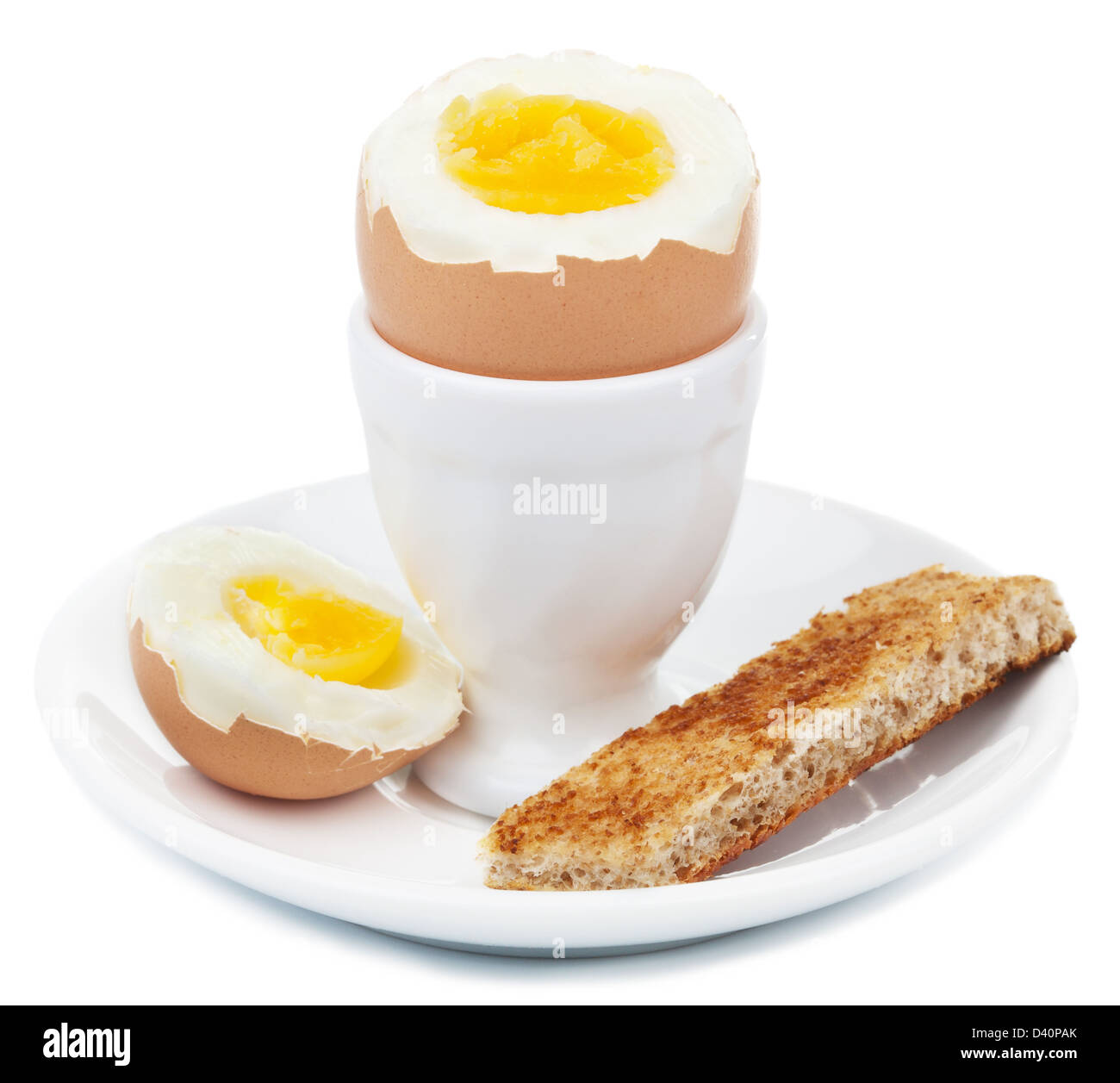 boiled egg in eggcup isolated Stock Photo