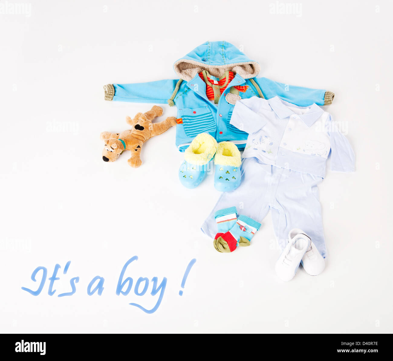 Blue boy clothing for baby isolated on white background. It's a boy