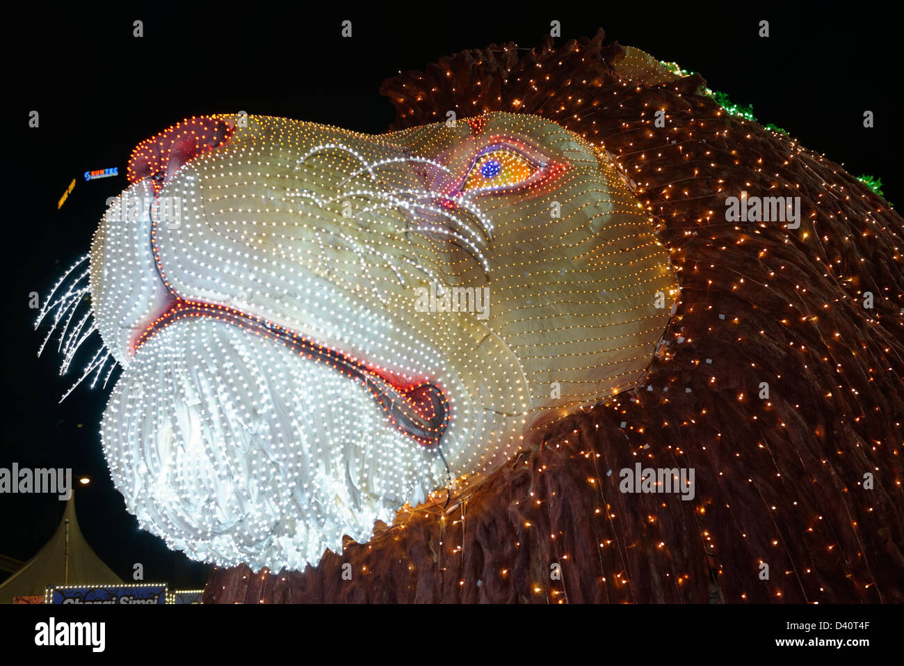 Lion head in lights form a float at the Chingay parade, Singapore, to celebrate Chinese New Year. Stock Photo