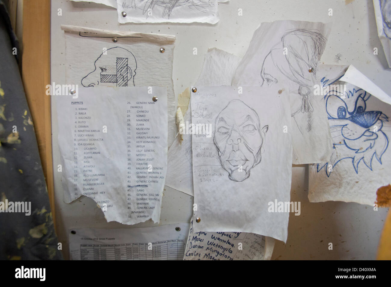 Nairobi, Kenya. 26th Feb 2013. Behind the scenes of Kenya's political satire 'The XYZ Show'. Caricature sketches on a pin board. Stock Photo