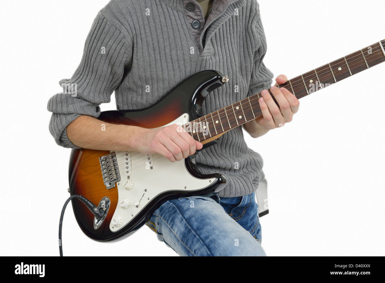 Teenager playing electric guitar Stock Photo