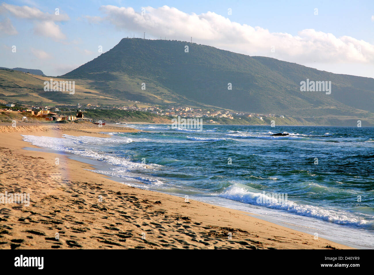 Sunset at one of the scenic beaches in Sardinia in Italy Stock Photo