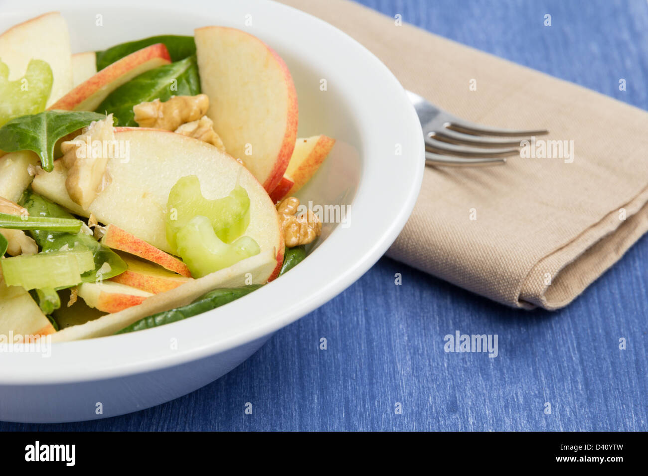 modern variation of waldorf salad, on blue wood table Stock Photo - Alamy