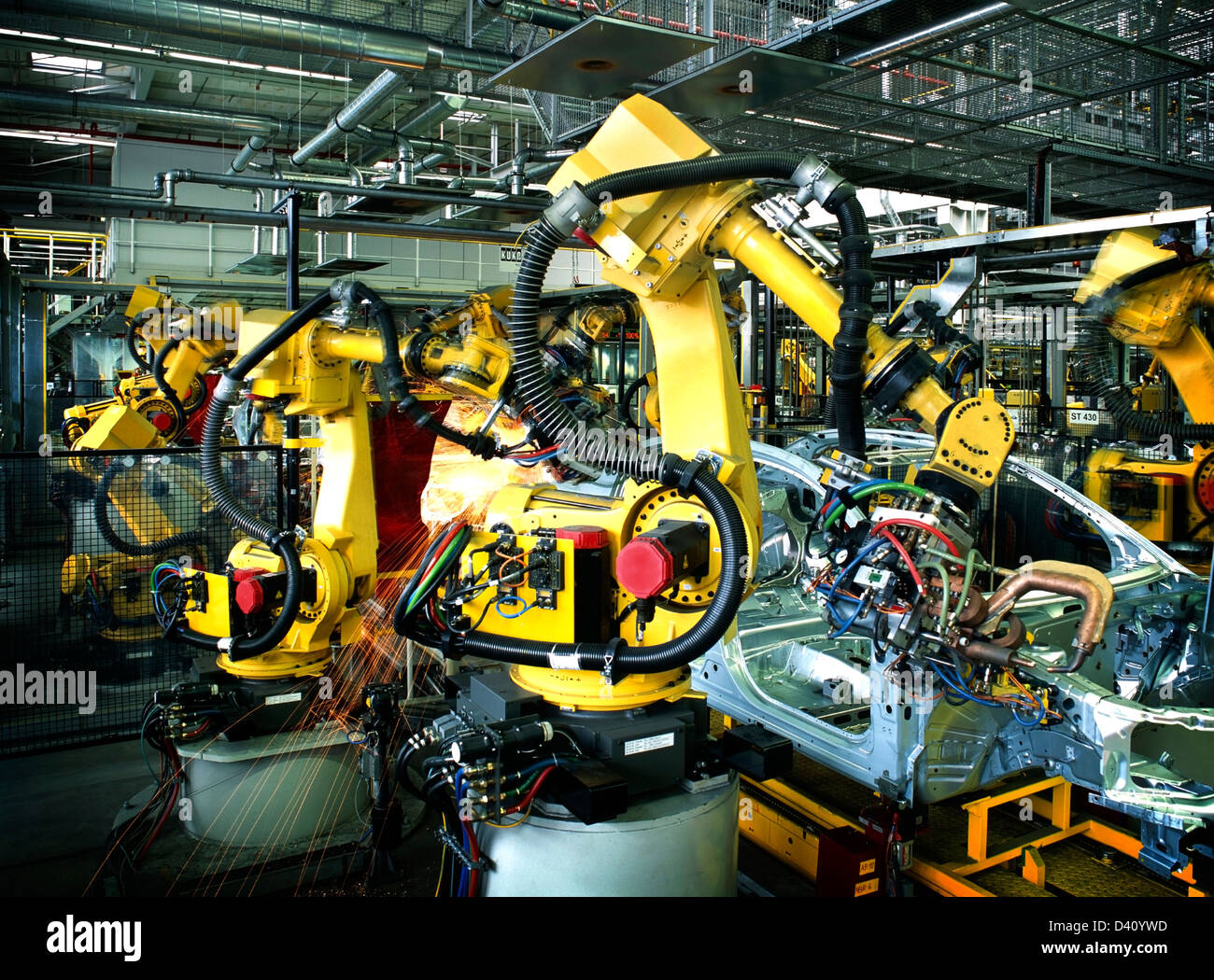 welding robots in a car manufactory Stock Photo