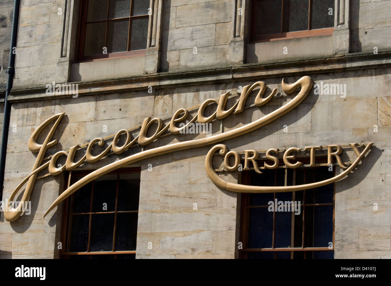 A gilt sign reading ‘Jacobean Corsetry’ found in virginia street, Glasgow Stock Photo