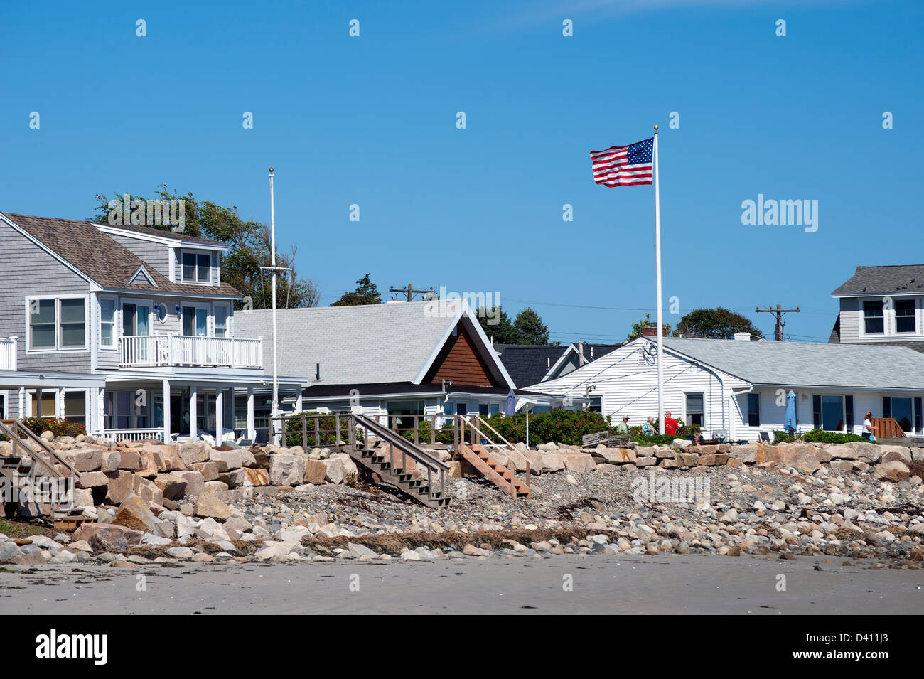 Beach houses and American flag in Moody Beach, Maine, USA Stock Photo