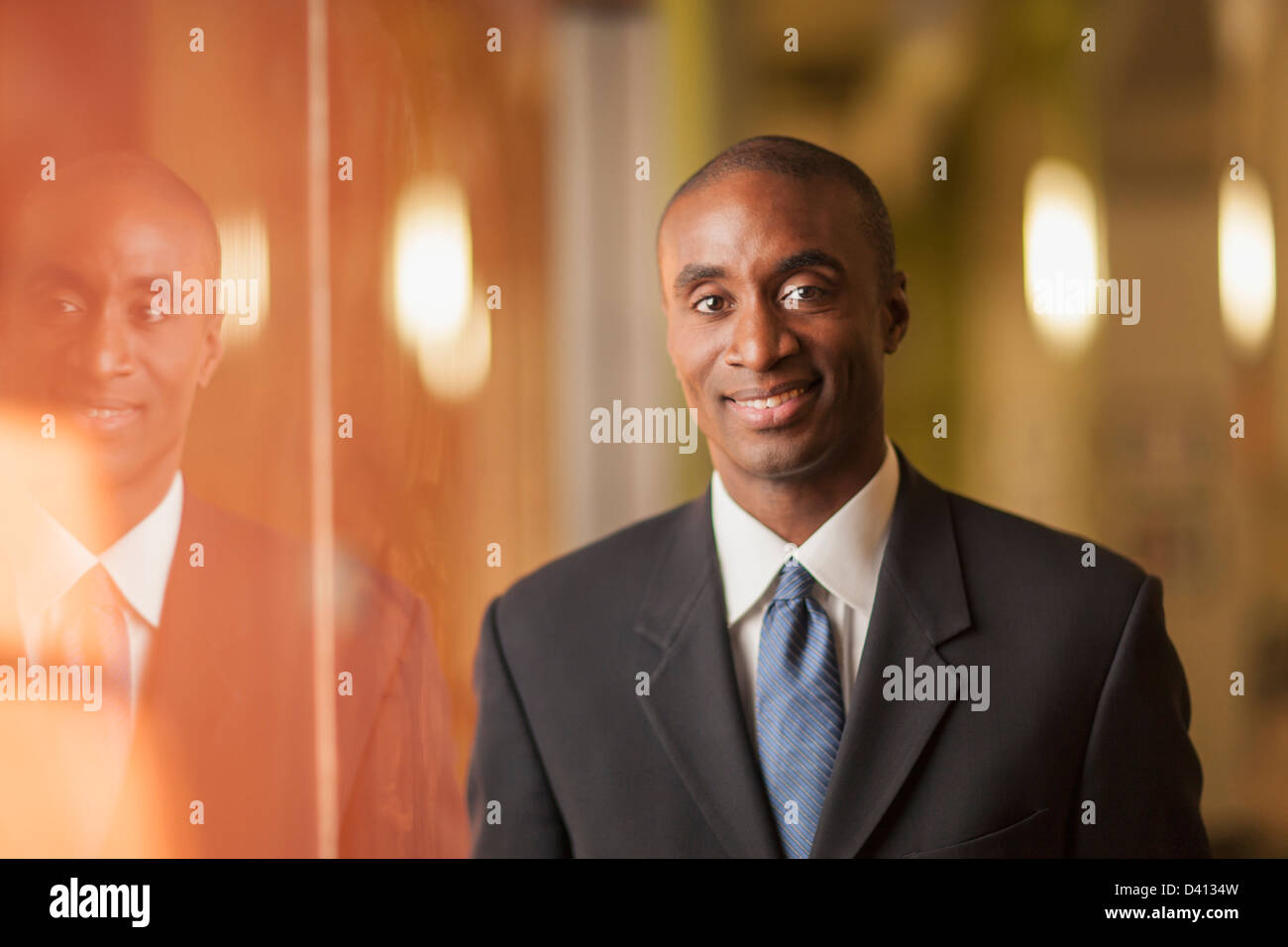 Black businessman smiling Stock Photo - Alamy