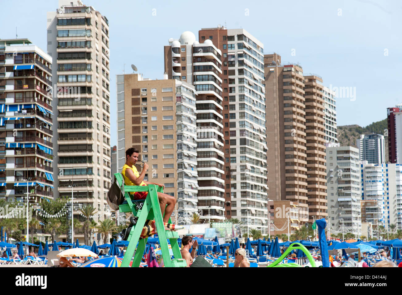 Lifeguard in his high chair on the beach, Benidorm, Costa Blanca, Spain Stock Photo