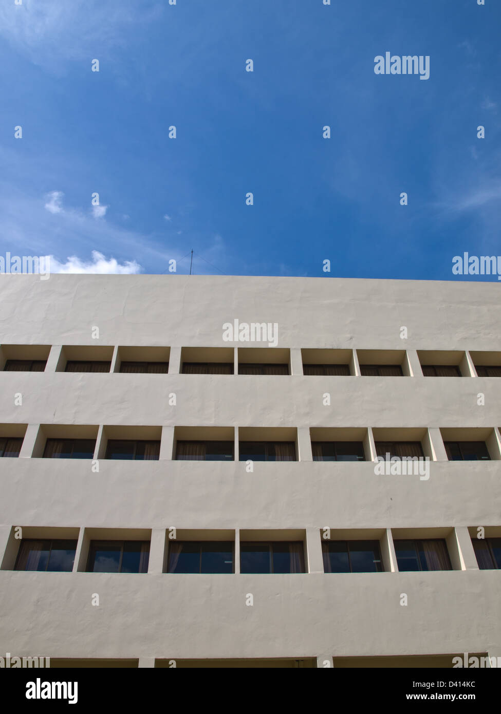 Facade windows of office building on blue sky Stock Photo - Alamy