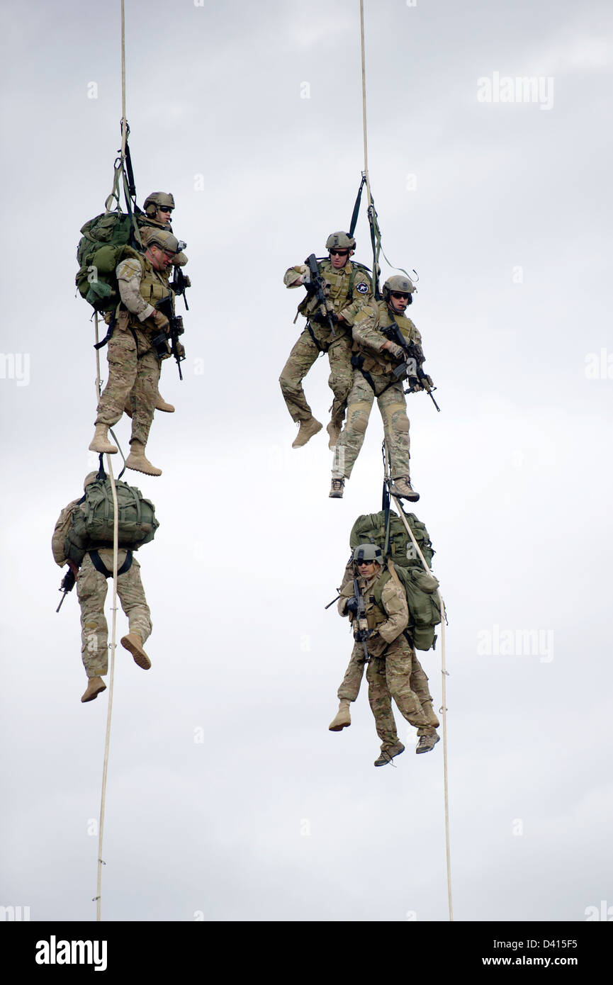 US Green Beret Special Forces soldiers during a training event February 5, 2013 at Eglin Air Force Base, Florida. The Green Berets practiced Special Purpose Insertion Extraction used to rapidly insert or extract soldiers from terrain that does not allow helicopters to land. Stock Photo