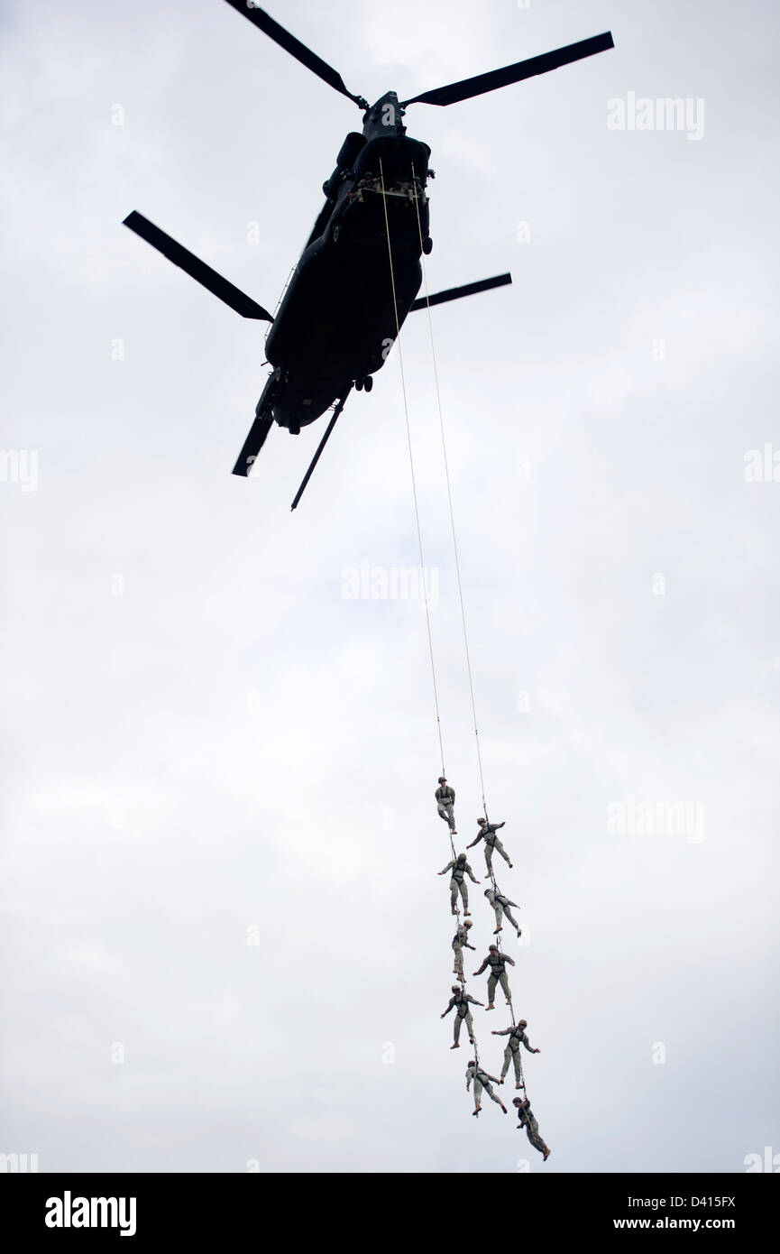 US Green Beret Special Forces soldiers during a training event February 5, 2013 at Eglin Base Air Force Base, Florida. The Green Berets practiced Special Purpose Insertion Extraction used to rapidly insert or extract soldiers from terrain that does not allow helicopters to land. Stock Photo