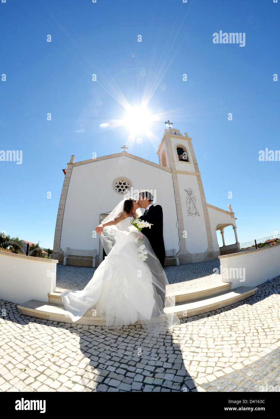 Bridal couple front church hi-res stock photography and images - Alamy