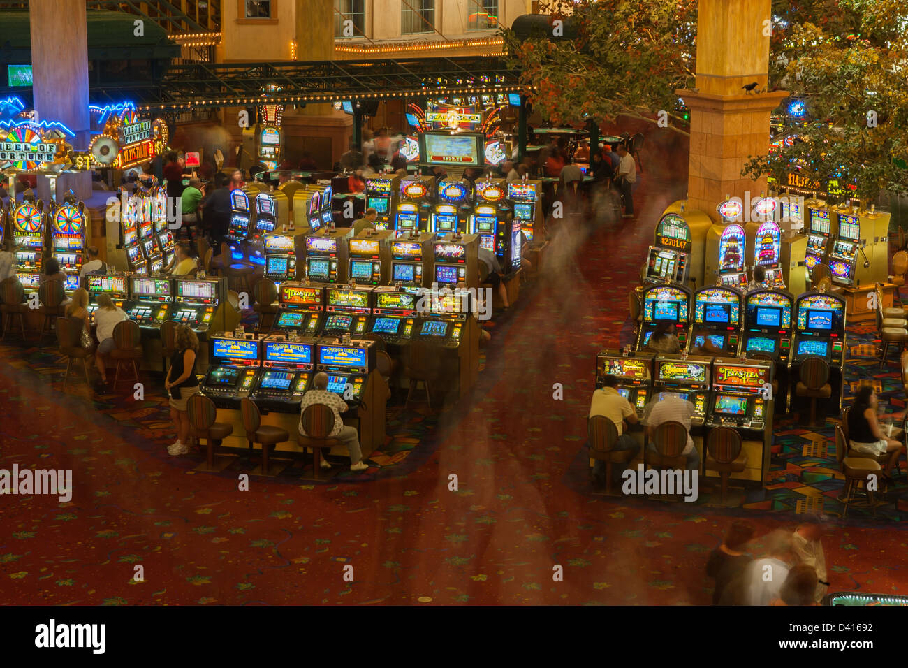 People in casino playing on slot machines in Las Vegas Stock Photo Alamy