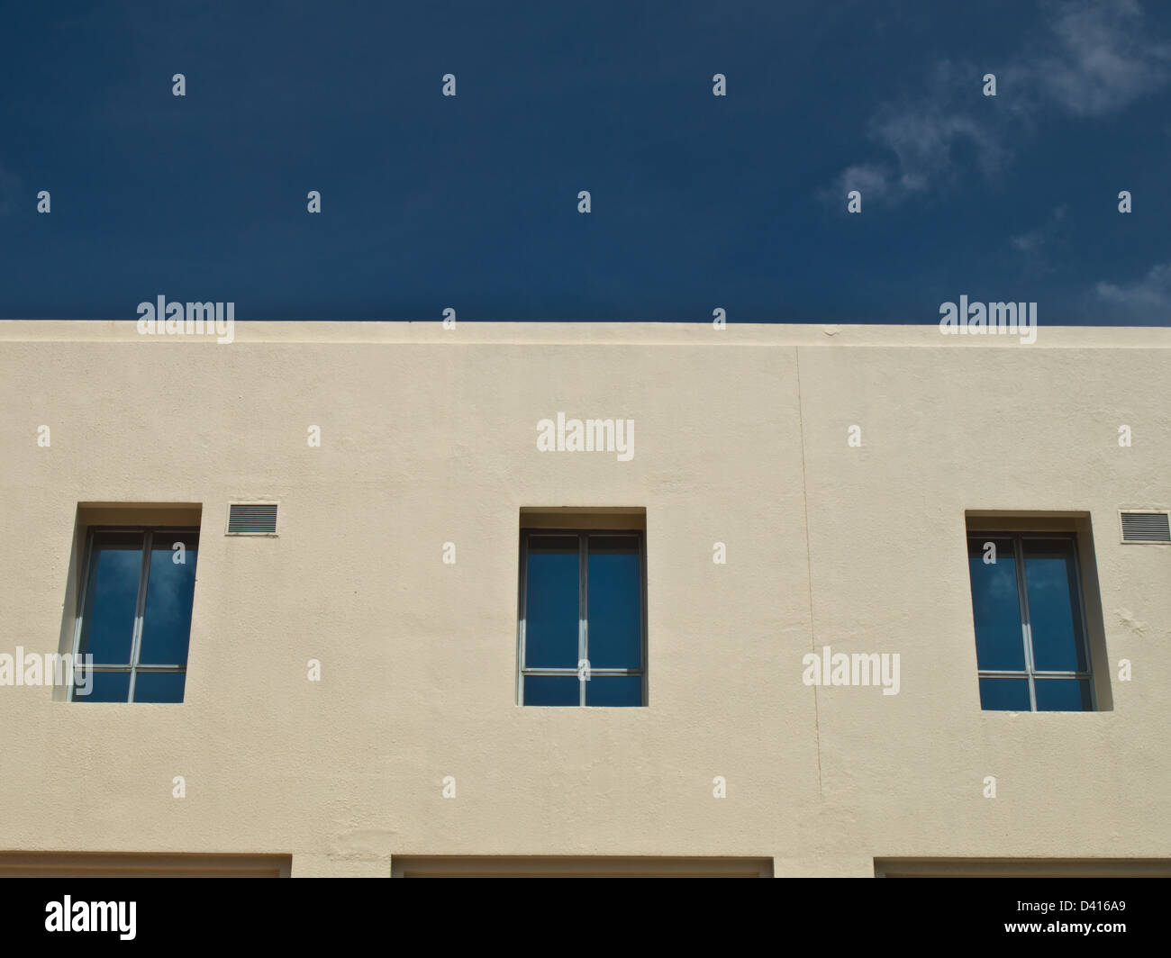 Facade windows of office building on blue sky Stock Photo - Alamy