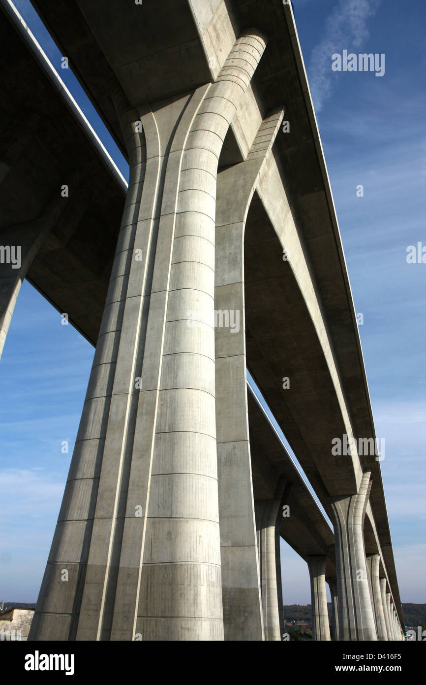 high and long concrete bridge across the valley Stock Photo