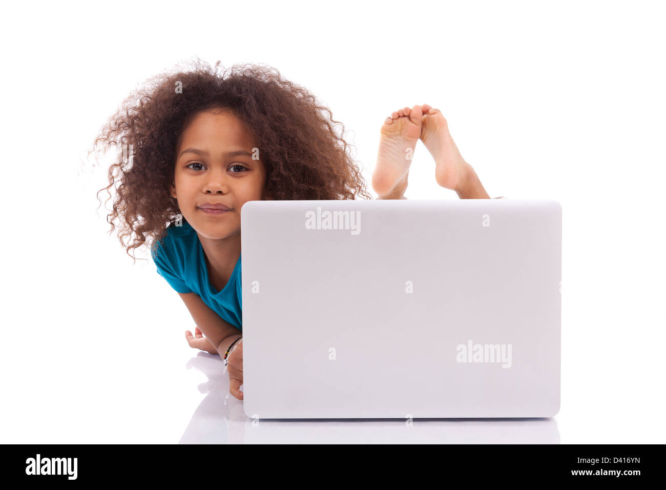 Little african asian girl using a laptop, isolated on white background ...