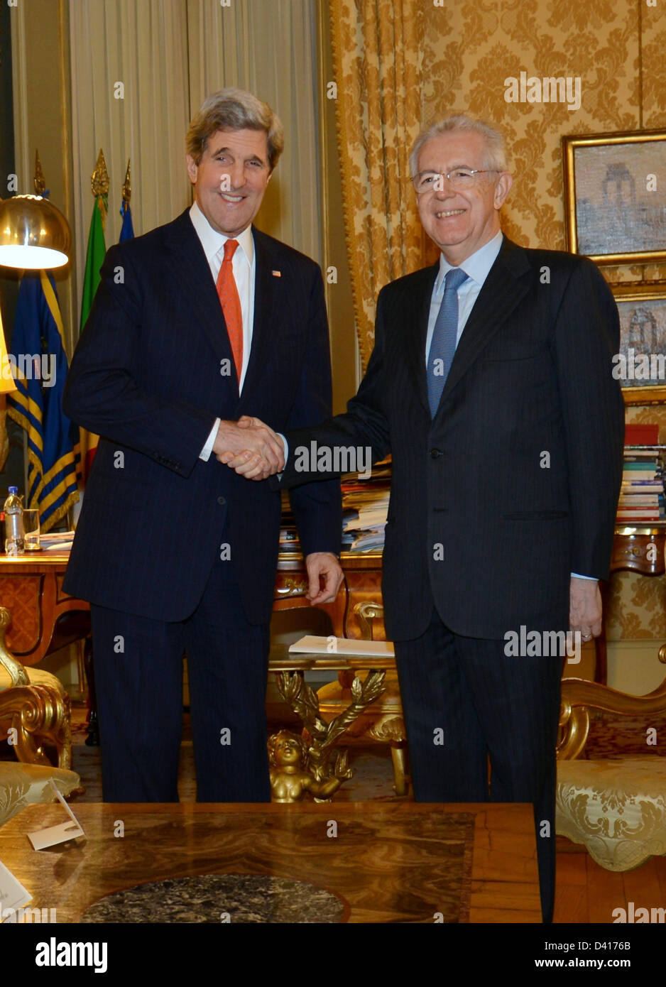 US Secretary of State John Kerry meets with Italian Prime Minister Mario Monti February 28, 2013 in Rome, Italy. Kerry is on an 11-day trip, his first as secretary of state stopping in London, Berlin, Paris, Rome, Ankara, Cairo, Riyadh, Abu Dhabi and Doha. Stock Photo