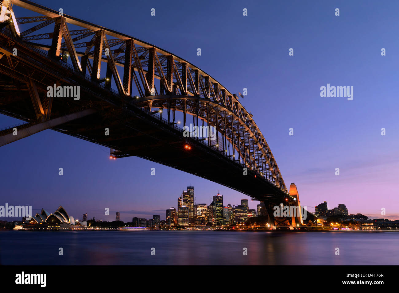 Sydney Harbour Bridge at night with city skyline and Opera House Stock ...