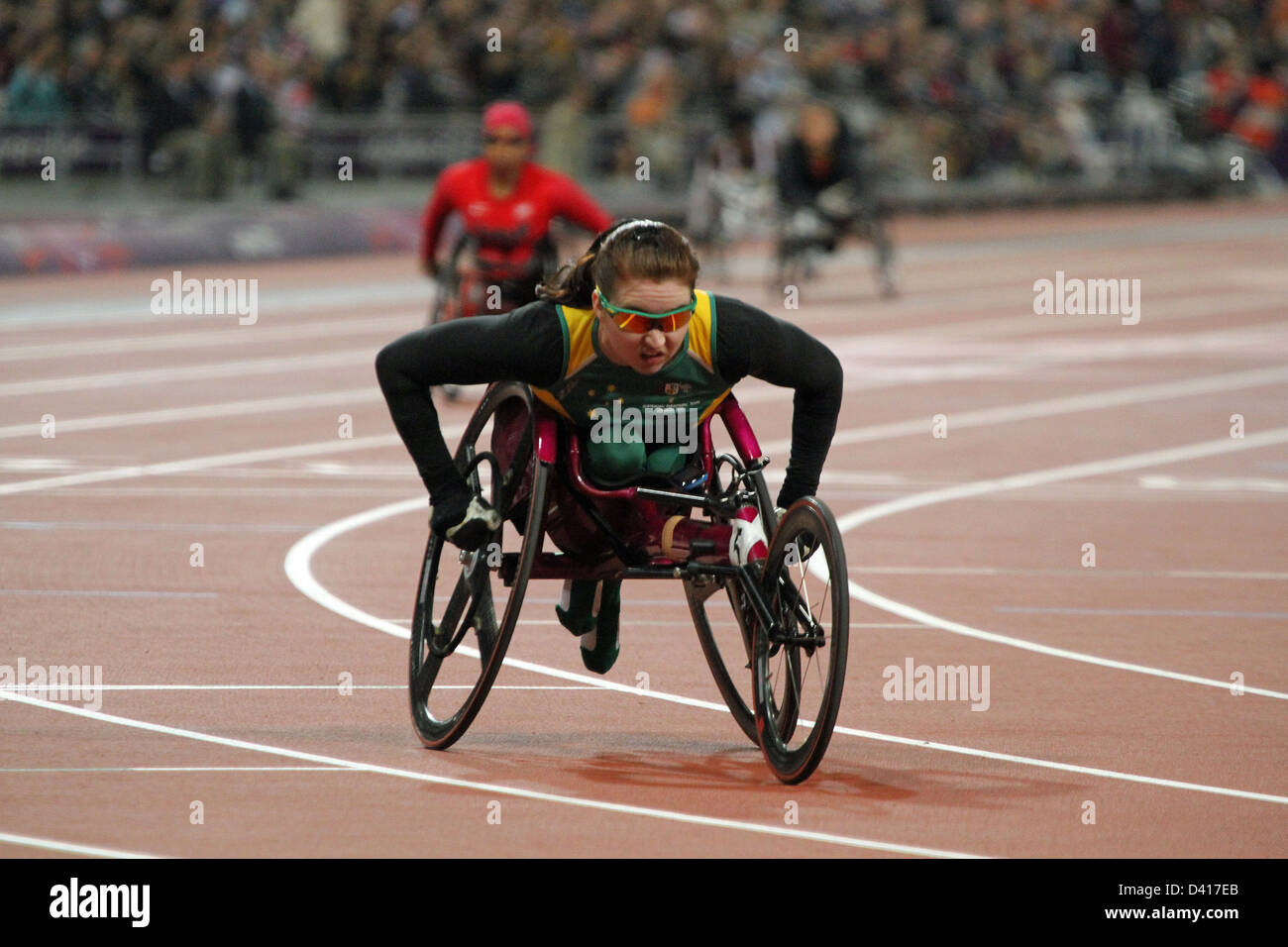 Angela Ballard of Australia in the womens 200m - T53 in the Olympic stadium at the London 2012 Paralympic games. Stock Photo