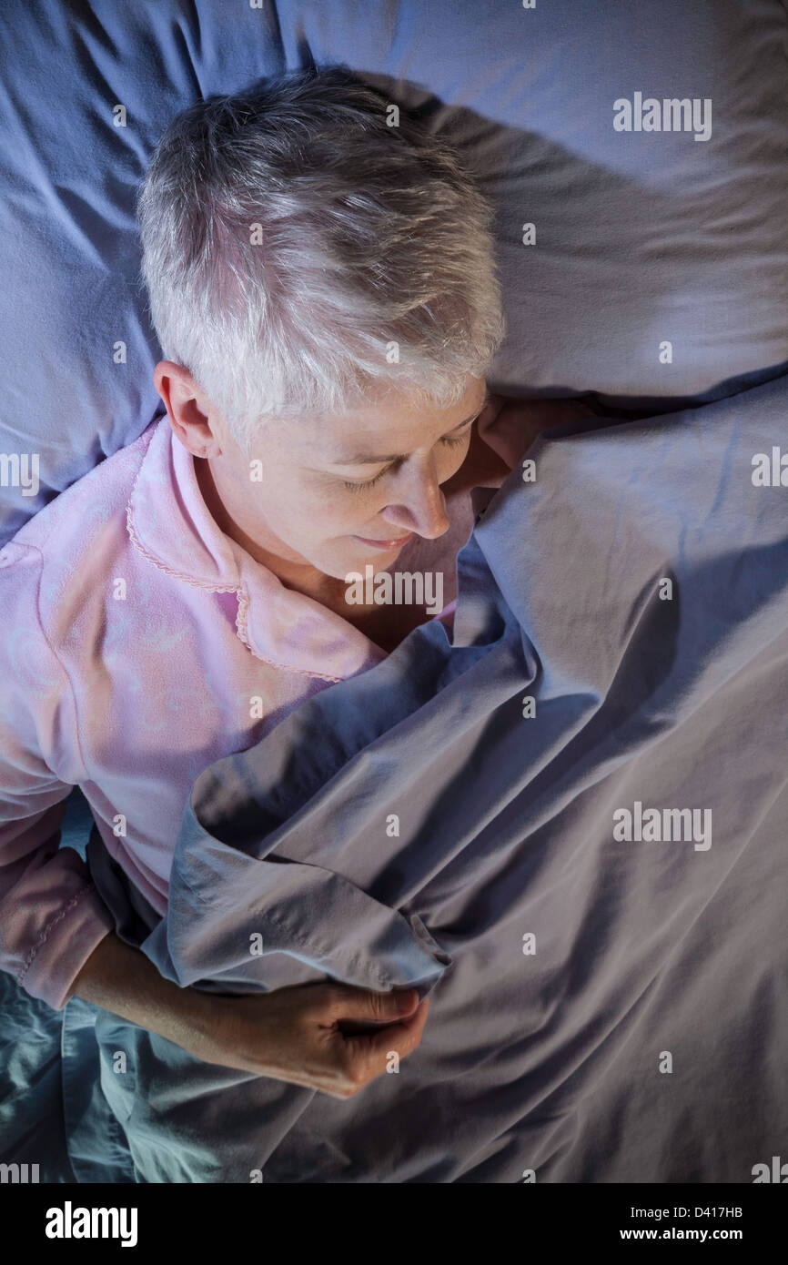 Serene mature woman gray hair hi-res stock photography and images - Alamy