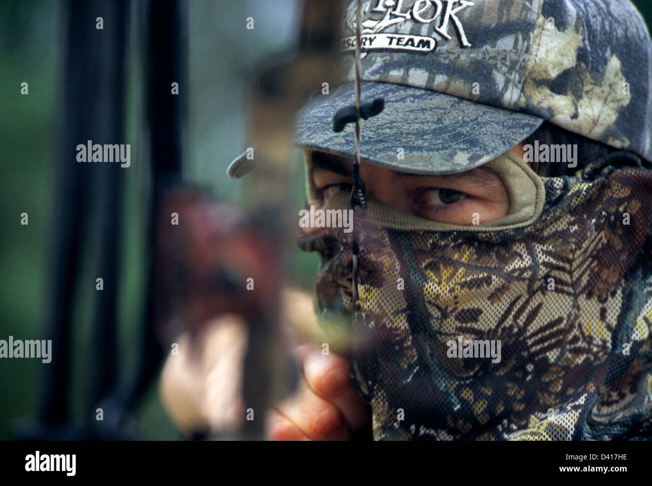 Texas archery hunter aiming with his bow Stock Photo Alamy