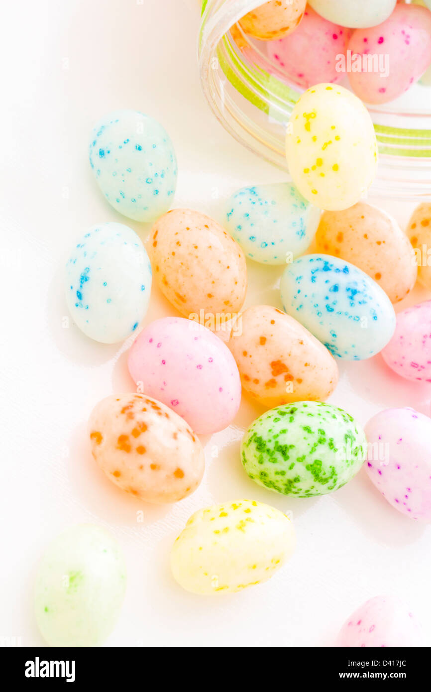 Assorted jelly beans in pastel colors with darker spots Stock Photo Alamy