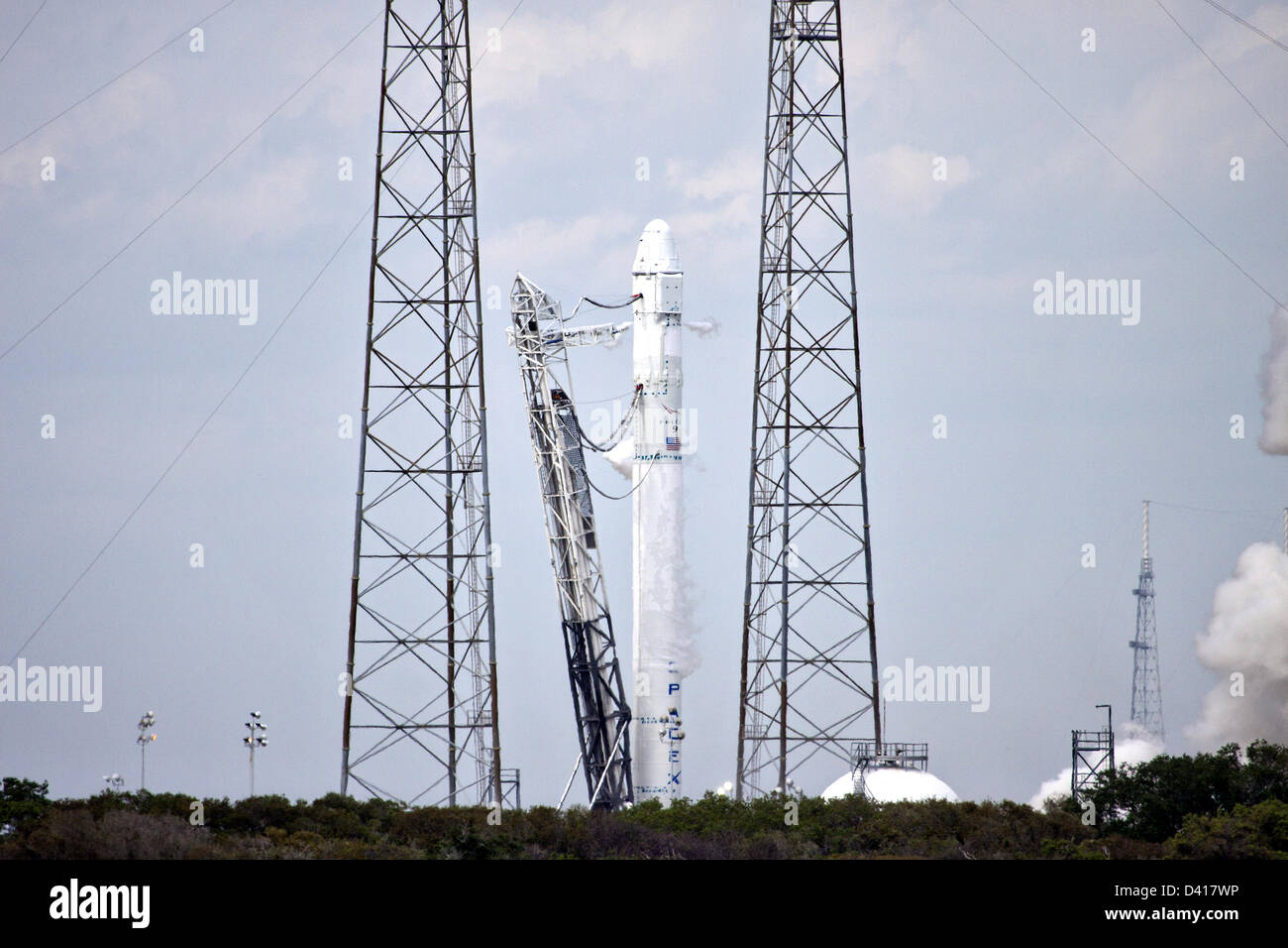 The SpaceX Falcon 9 commercial launch rocket on the launch pad at Launch Complex 40 in preparation for the upcoming SpaceX 2 mission February 28, 2013 at Cape Canaveral, Florida. Stock Photo