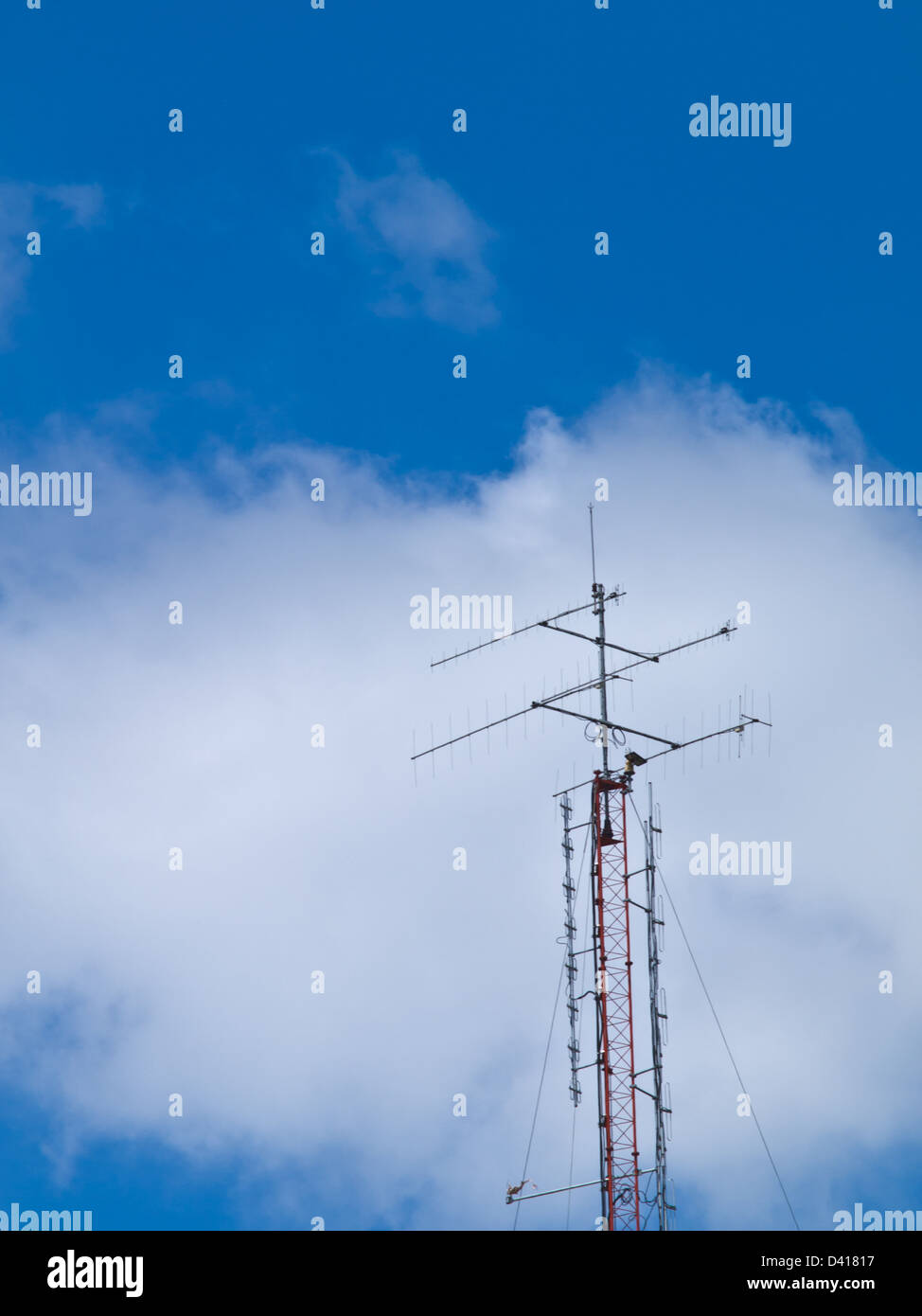 antenna tower on blue  sky background Stock Photo