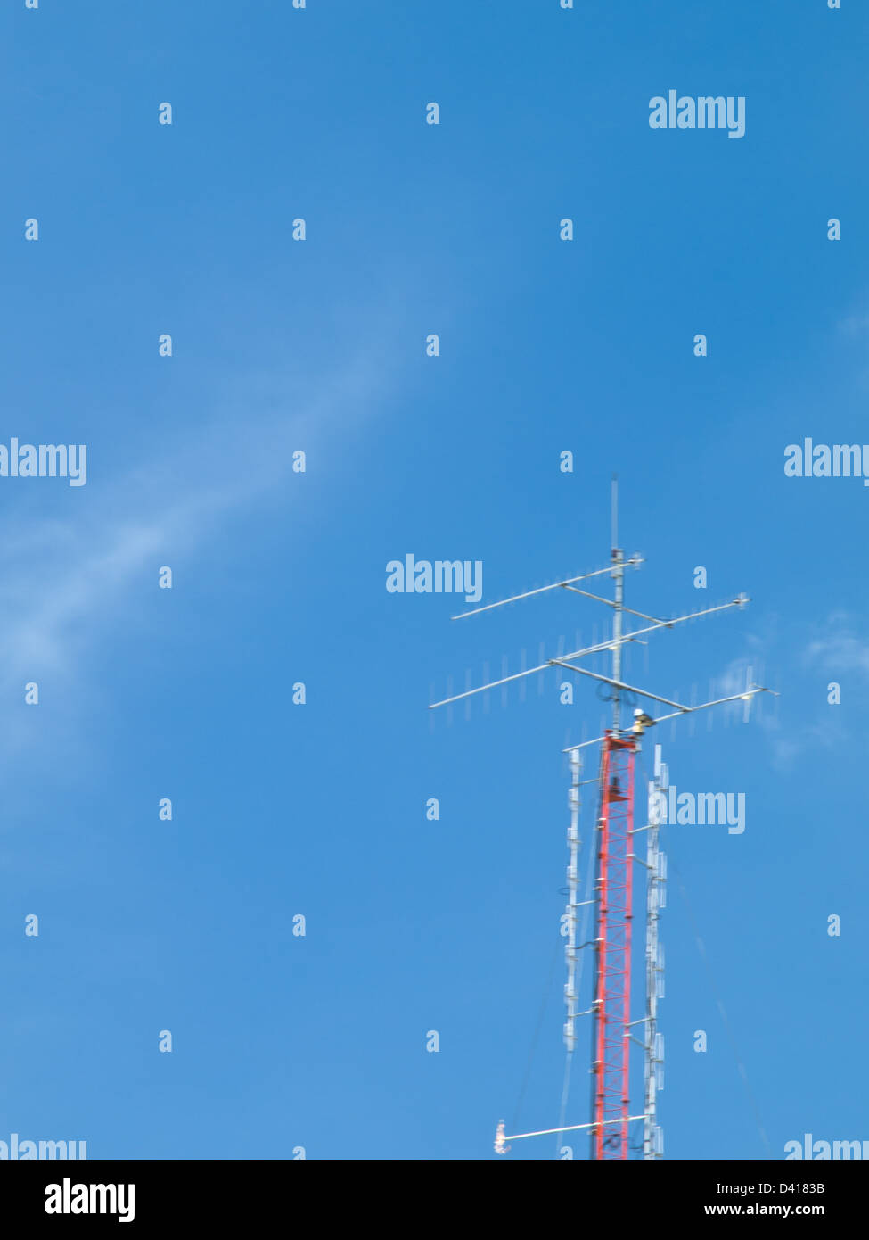 antenna tower on blue sky background Stock Photo - Alamy