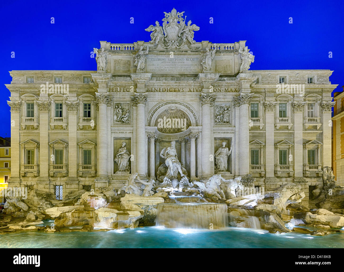Night time floodlit details of statues in Trevi fountain in Rome Italy Stock Photo