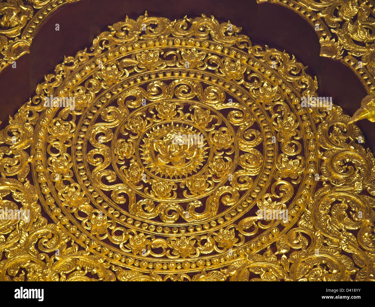golden wooden carving, Wat Phrathat chomkitti temple in Chiang rai, Thailand. Stock Photo
