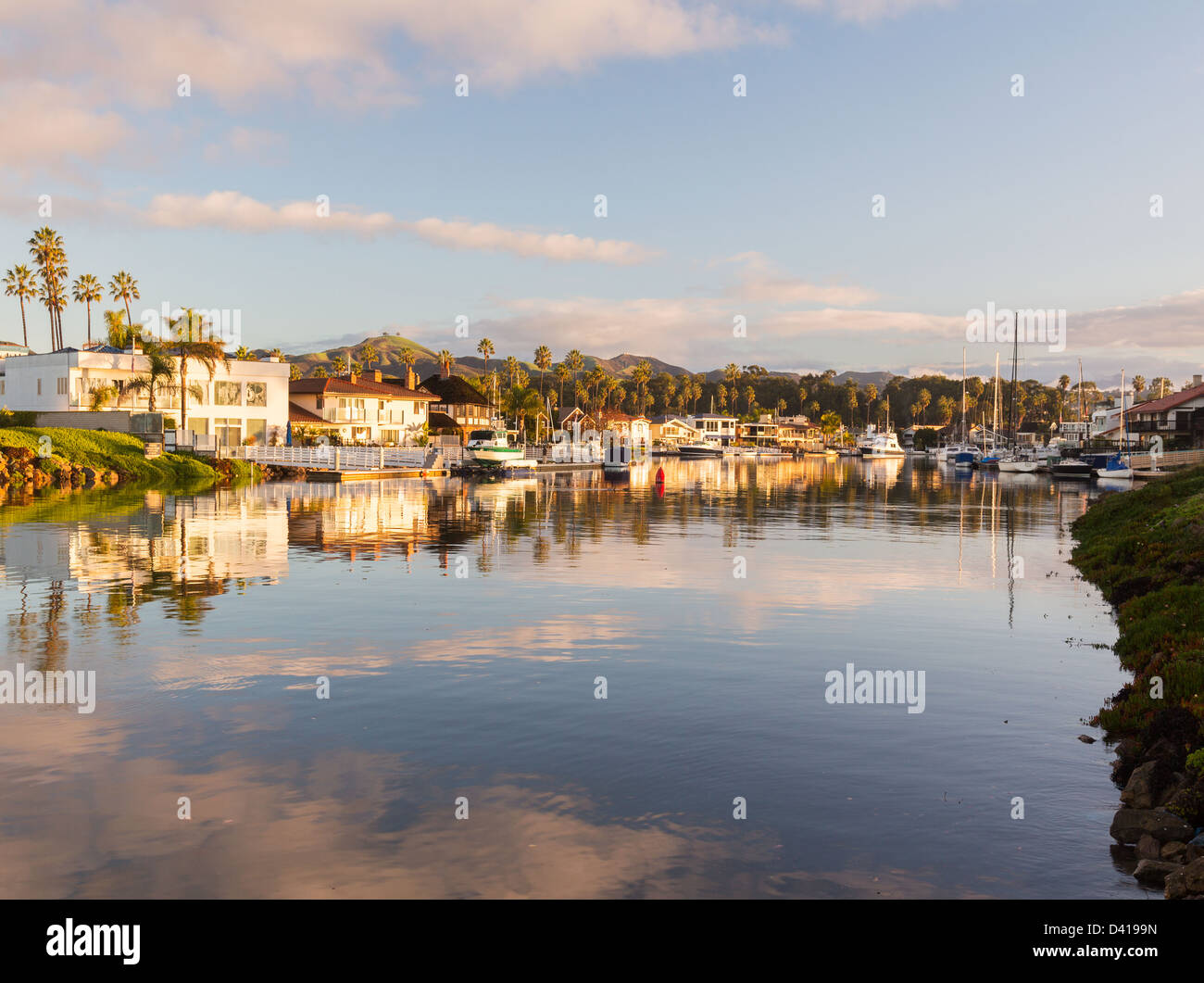 Ventura, California, USA with upscale luxury modern homes and yachts boats, Sunrise at luxury residential development by the water Stock Photo
