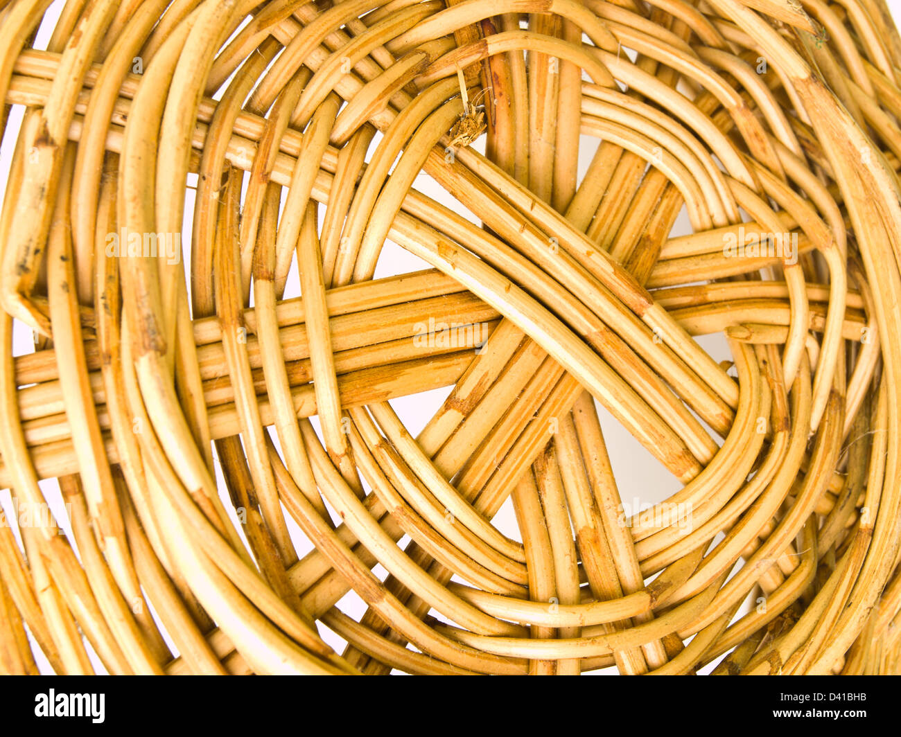 Rattan wicker basket isolated on white Stock Photo - Alamy