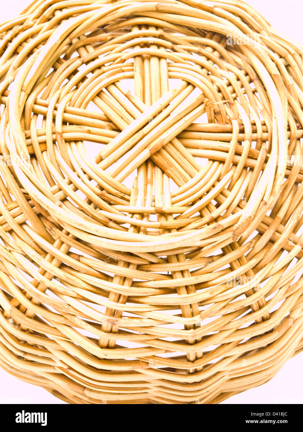 Rattan wicker basket isolated on white Stock Photo - Alamy